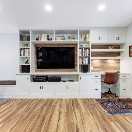 living room with custom-built shelving and cabinetry in edmonton