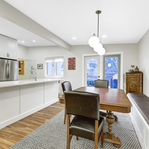 dining room with banquette and wainscotting panels edmonton
